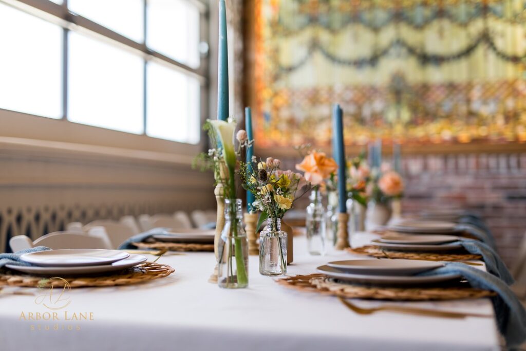 a table set with place settings and place settings