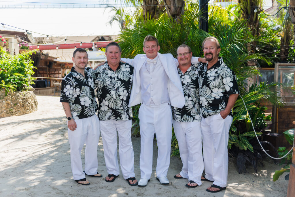 a group of men standing next to each other