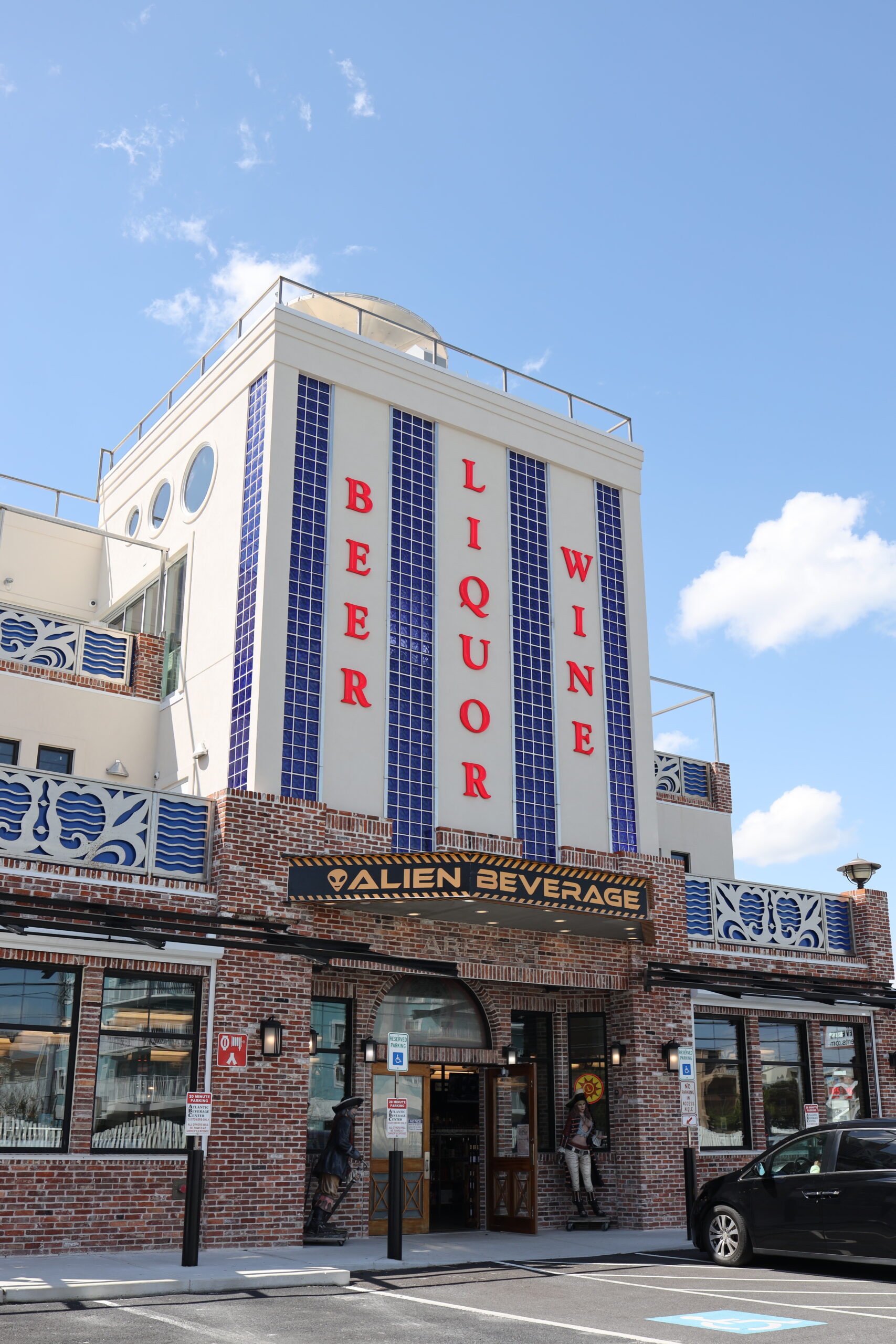 a tall building with a sign on the front of it