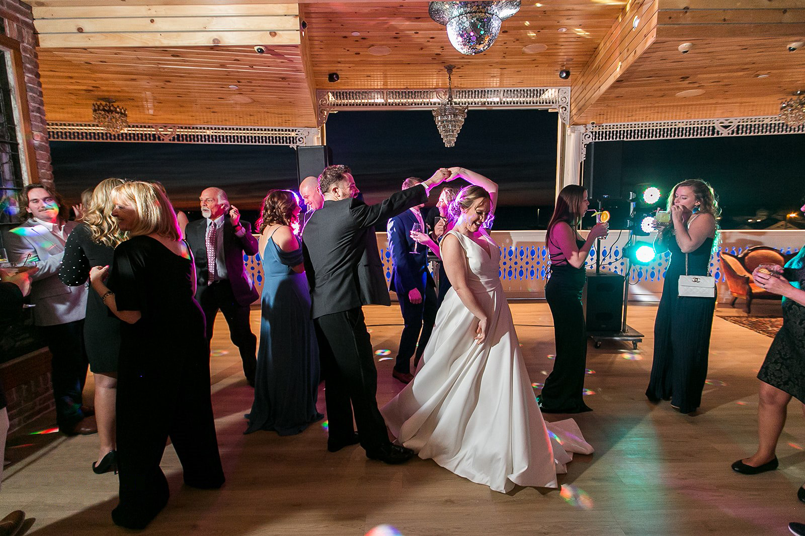 a bride and groom dancing at their wedding reception