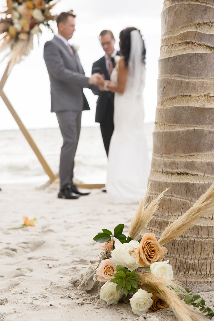 a couple getting married on the beach