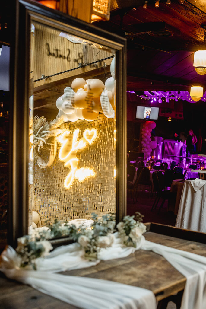 a wooden table with a white table cloth on top of it