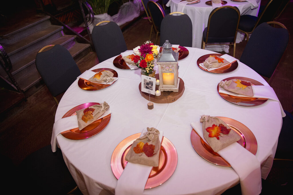 a white table topped with lots of plates of food