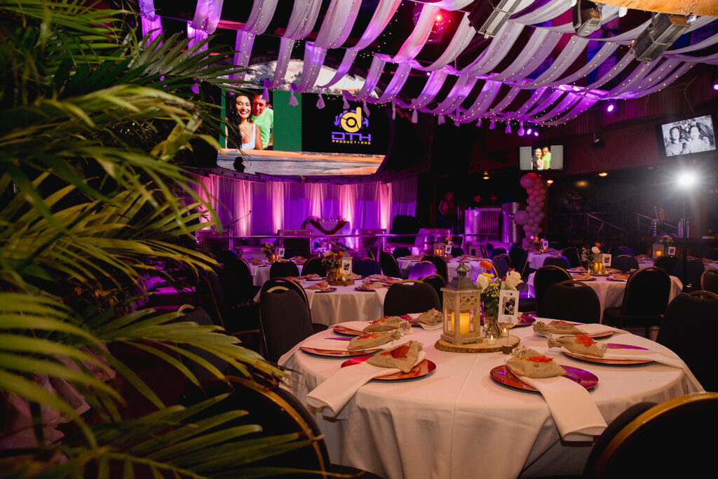 a banquet hall with tables set up for a formal function