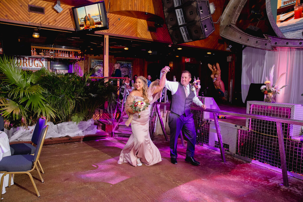 a bride and groom dancing on the dance floor