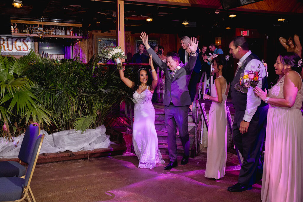 a group of people standing on top of a dance floor