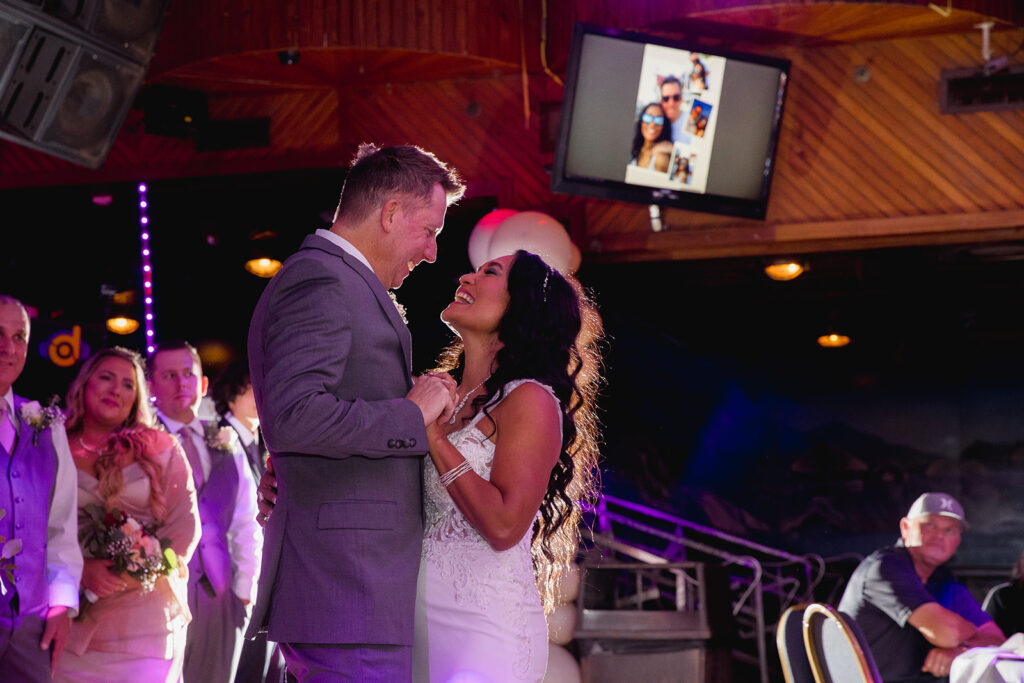 a bride and groom sharing a first dance