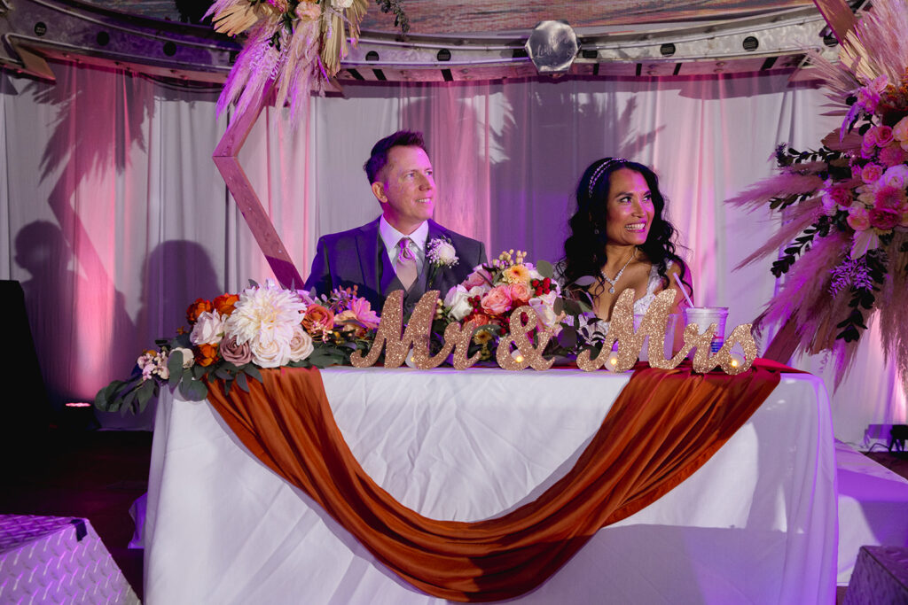 a man and a woman sitting at a table